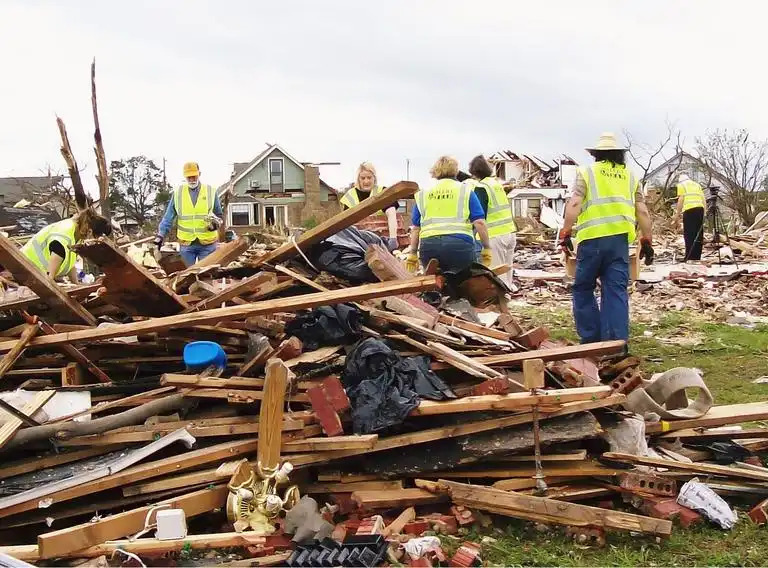 lions-5.10-disaster-relief-wood-pile-tornado-clean-up